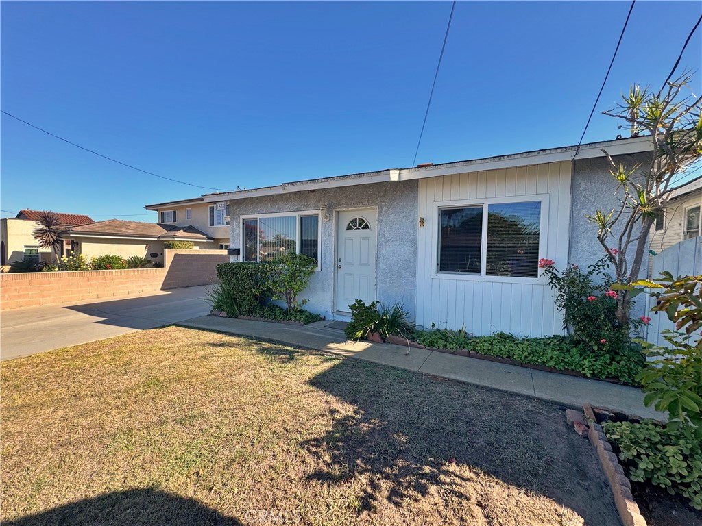1852 260th Street Lomita, CA 90717 - Photo 2 of 63 a front view of a house with garden