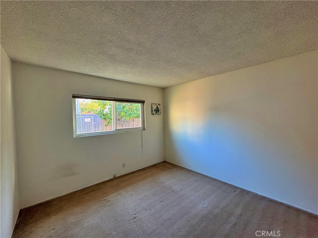 1852 260th Street Lomita, CA 90717 - Photo 22 of 63 a view of an empty room with a window