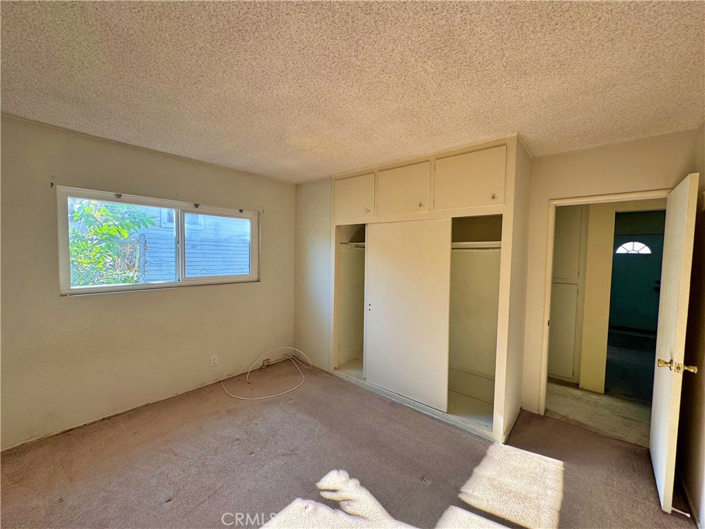 1852 260th Street Lomita, CA 90717 - Photo 24 of 63 a view of an empty room with glass door