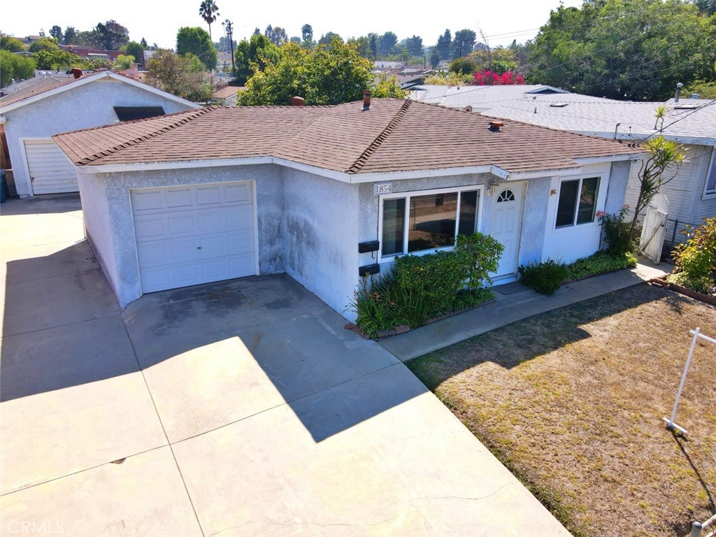 1852 260th Street Lomita, CA 90717 - Photo 4 of 63 a aerial view of a house with a yard