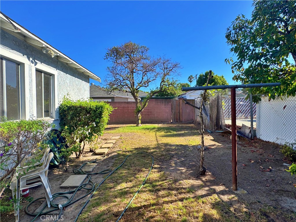 1852 260th Street Lomita, CA 90717 - Photo 57 of 63 a view of a house with a backyard