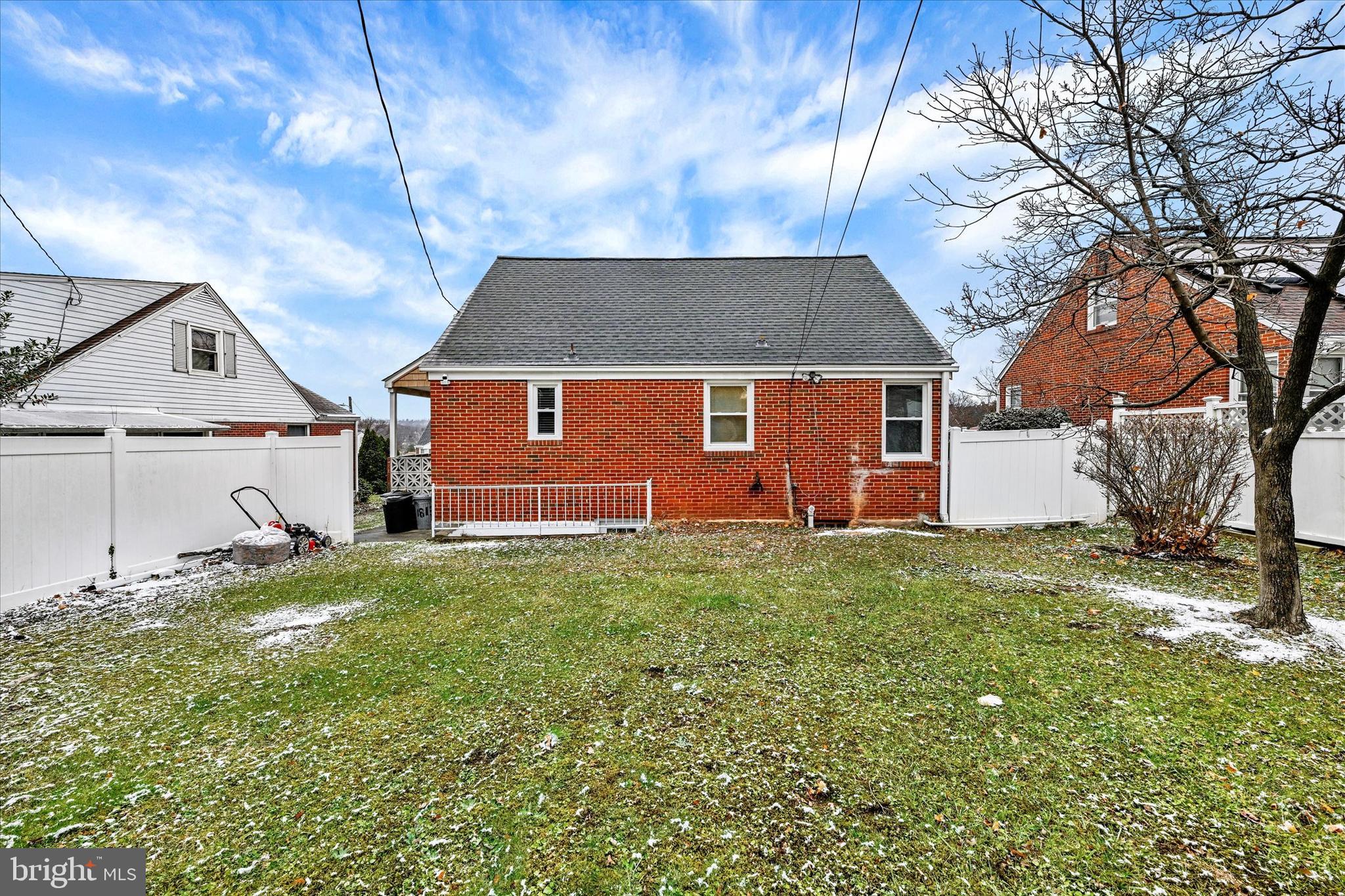 1813 Hanford Road Rosedale, MD 21237 - Photo 26 of 39 a front view of a house with a garden