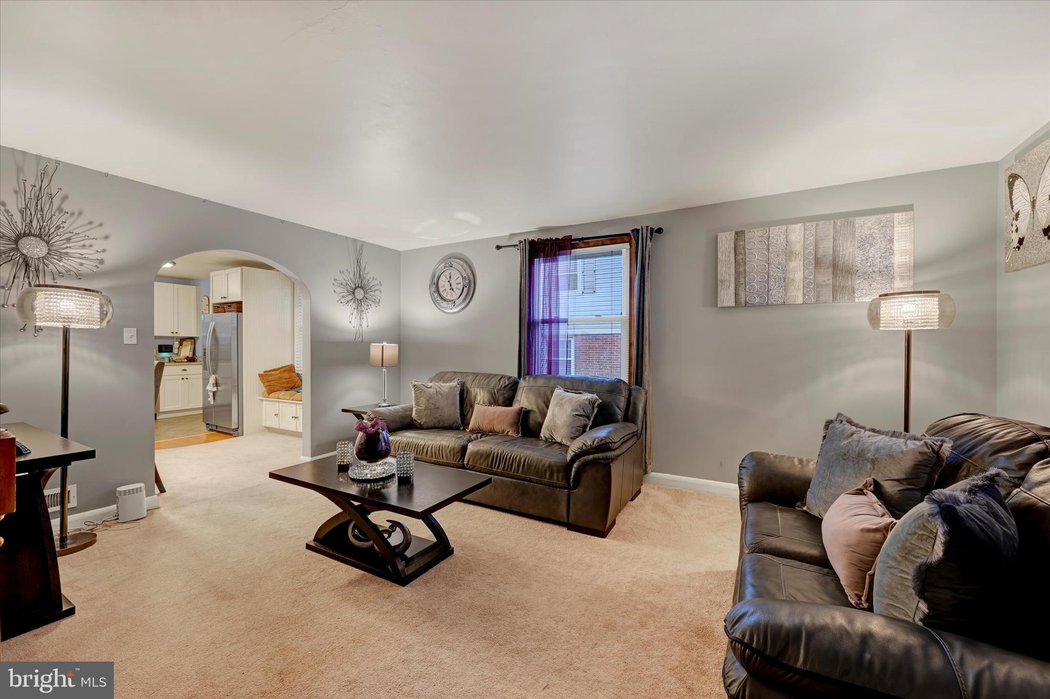 1813 Hanford Road Rosedale, MD 21237 - Photo 3 of 39 a living room with furniture a couch and a lamp
