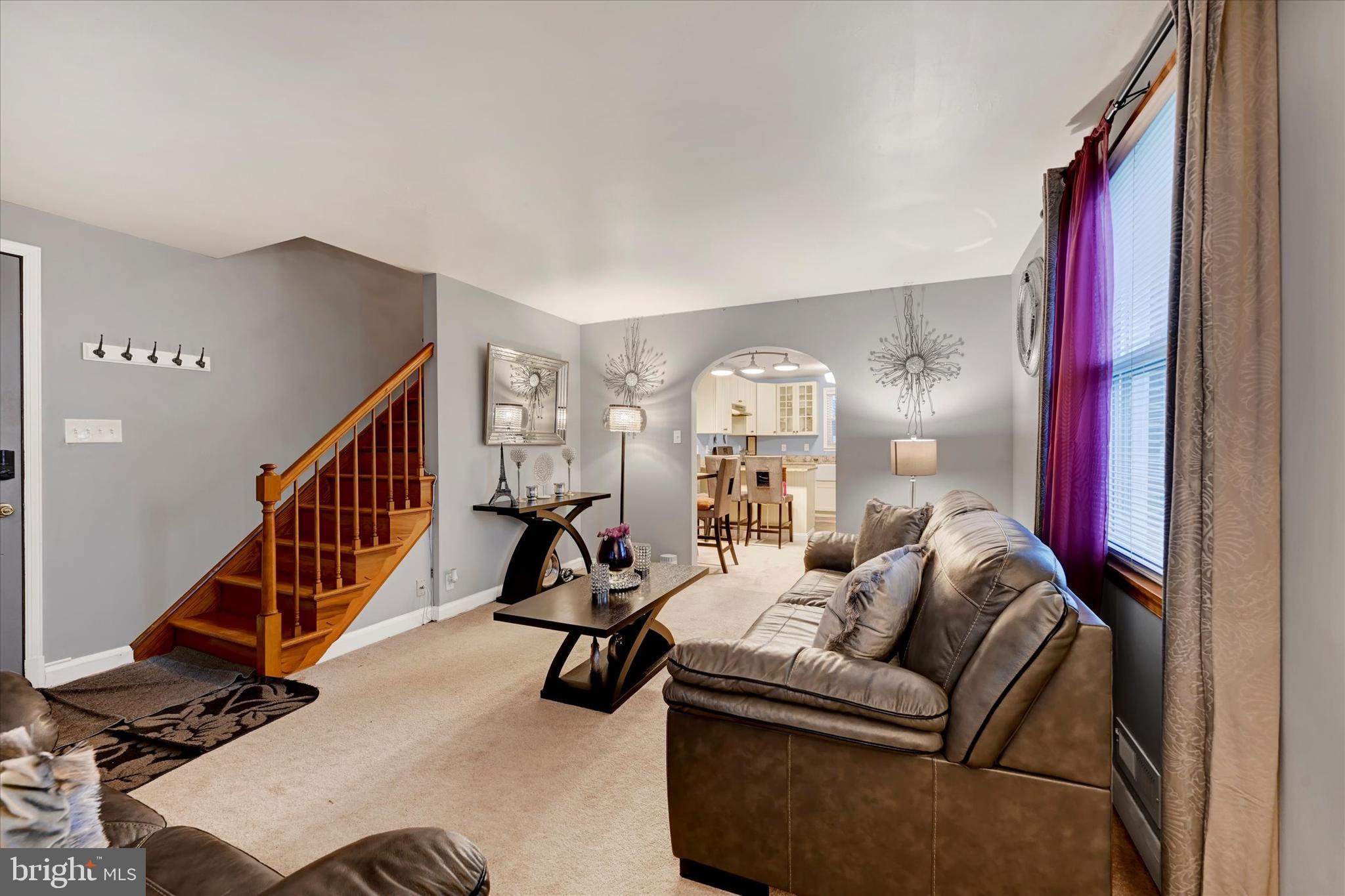 1813 Hanford Road Rosedale, MD 21237 - Photo 6 of 39 a living room with furniture or stairs and a couch