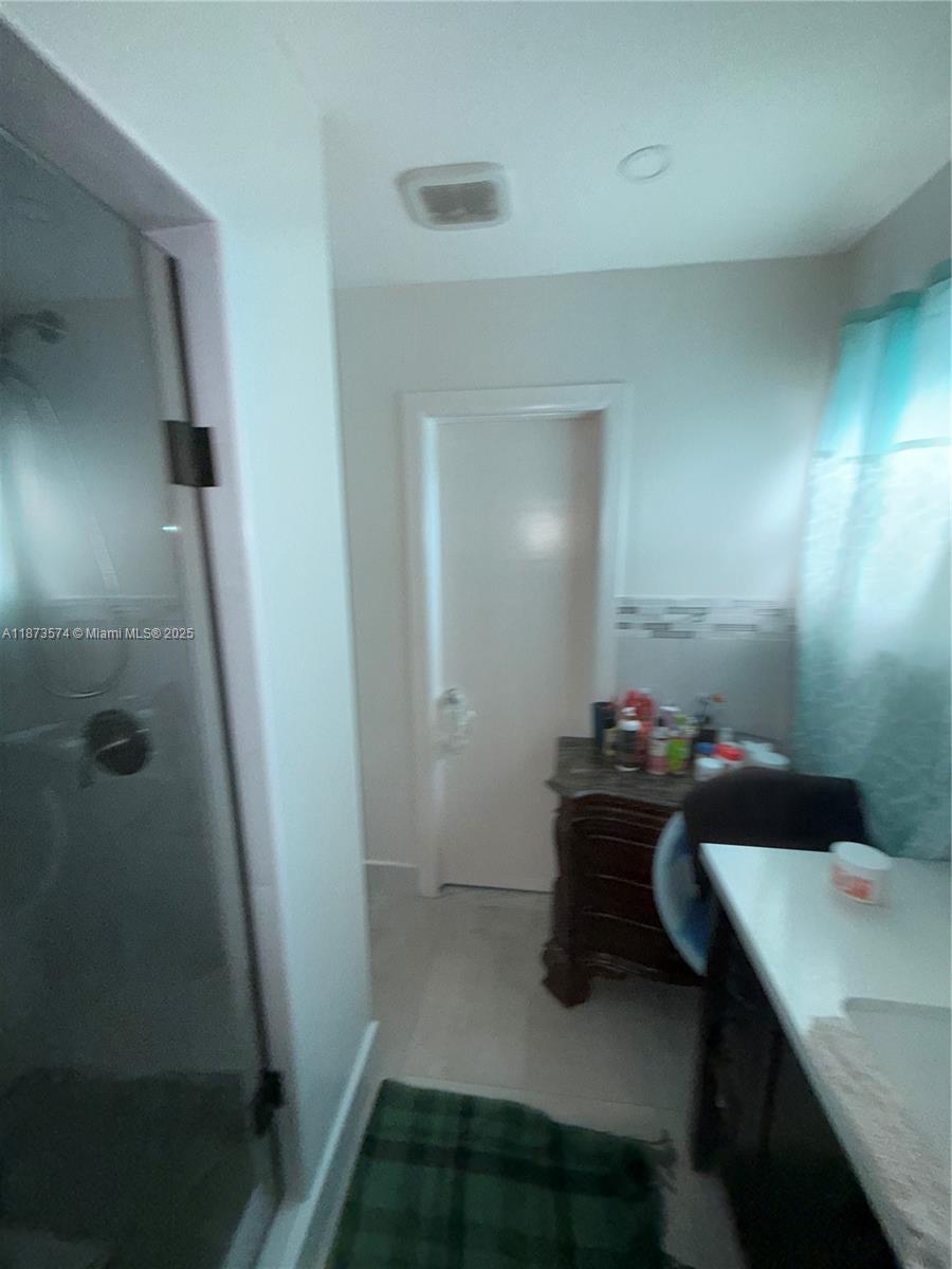 769 Southwest 8th Terrace Florida City, FL 33034 - Photo 9 of 25 a room that has a sink and a mirror