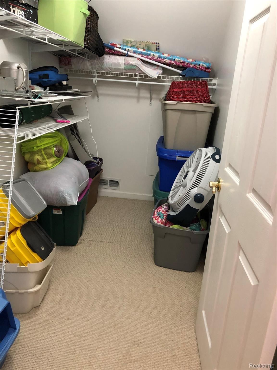 8286 Chilson Road Pinckney, MI 48169 - Photo 21 of 24 2ND FLOOR HALL WALK-IN CLOSET.JPG