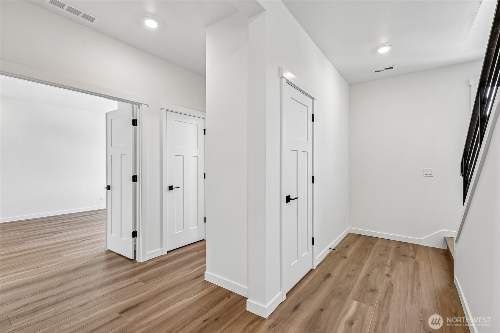 24229 13 Avenue Southeast, Unit CR27 Bothell, WA 98021 - Photo 16 of 40 a view of a hallway with wooden floor