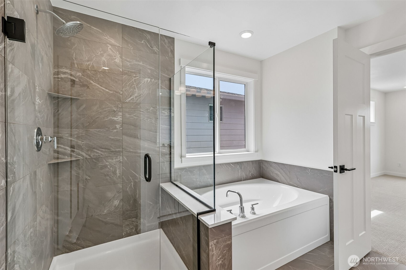 24229 13 Avenue Southeast, Unit CR27 Bothell, WA 98021 - Photo 27 of 40 a bathroom with a tub a toilet and a shower