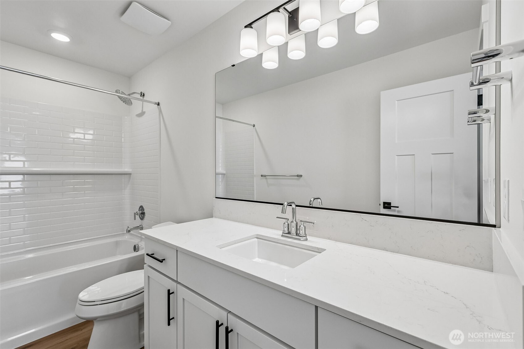 24229 13 Avenue Southeast, Unit CR27 Bothell, WA 98021 - Photo 36 of 40 a bathroom with a sink a toilet a mirror and shower