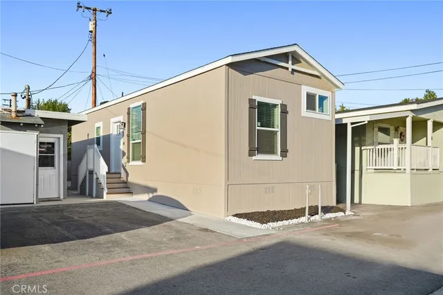 a front view of a house with a garage