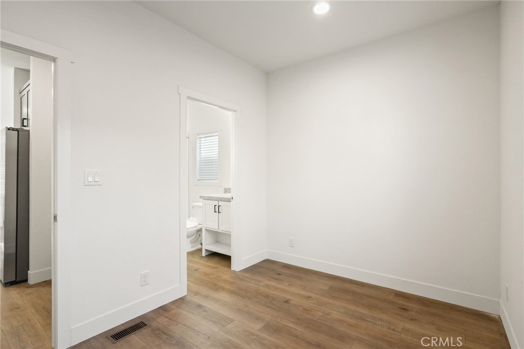 732 East Rte 66, Unit 7 Glendora, CA 91740 - Photo 13 of 15 a view of empty room with wooden floor