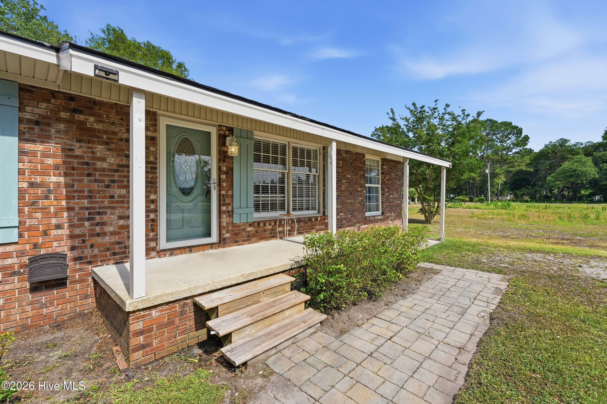 879 Bricklanding Road Southwest Shallotte, NC 28470 - Photo 6 of 56 Front porch
