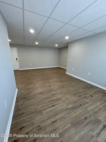 a bathroom with a double vanity sink toilet and shower