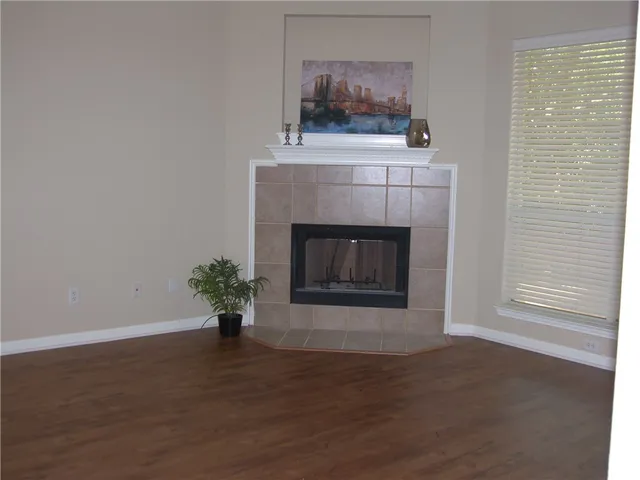 a living room with a fireplace