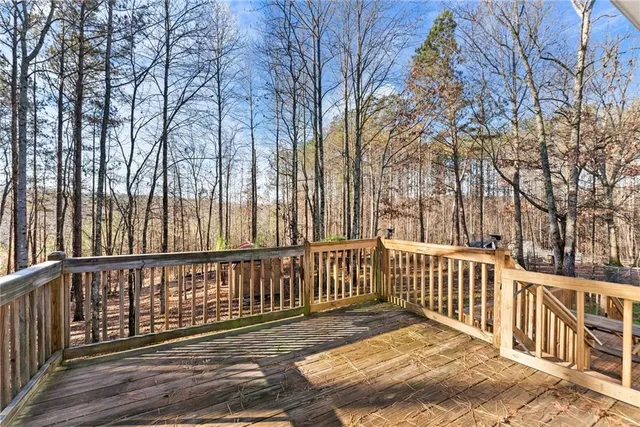 a view of a yard with cars