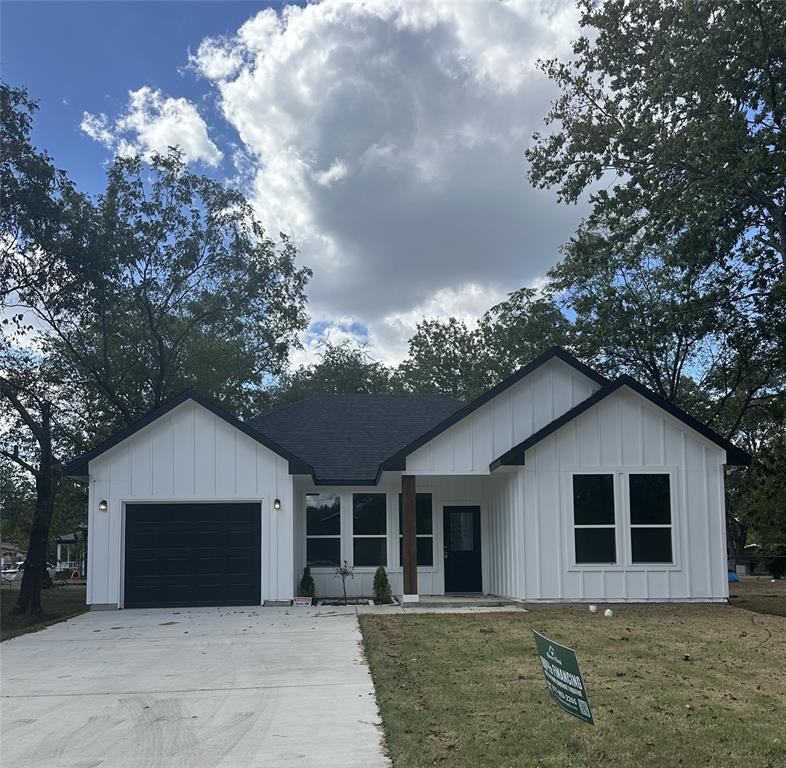 a house with trees in the background