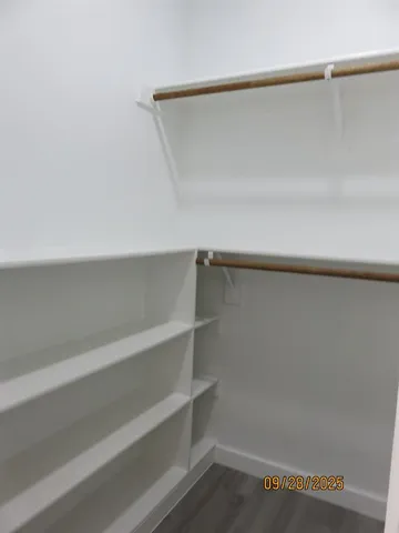 a view of small space with racks on the wall