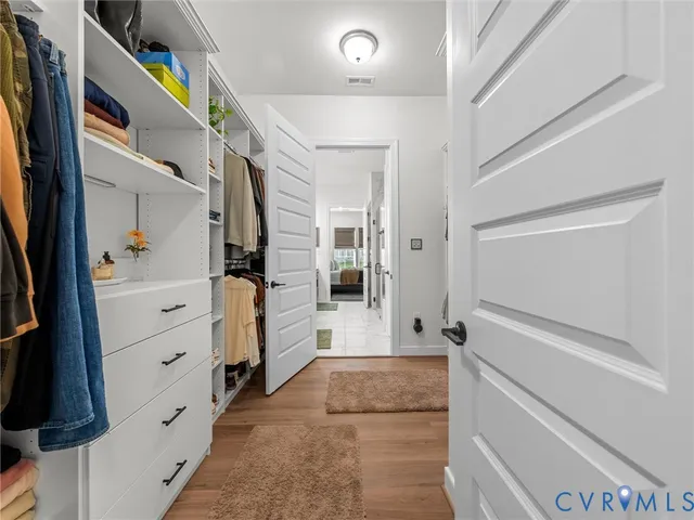 a bathroom with a tub and a shower