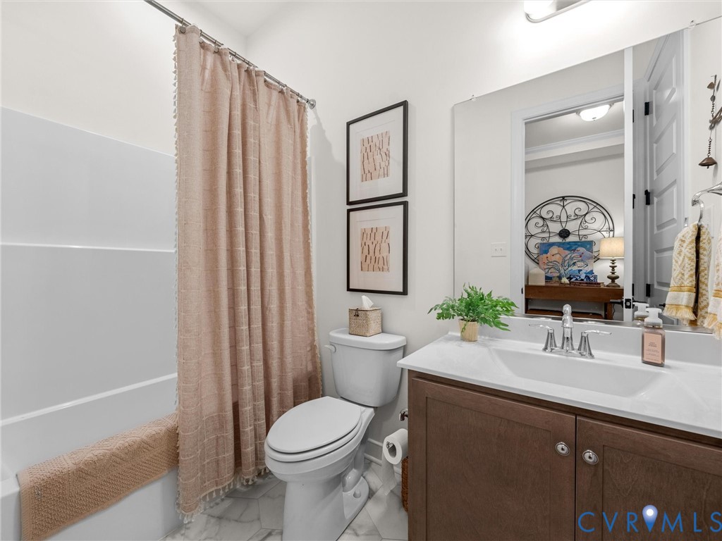 1813 Galley Place Chester, VA 23836 - Photo 31 of 38 Ensuite bathroom with shower / bath combo, vanity,
