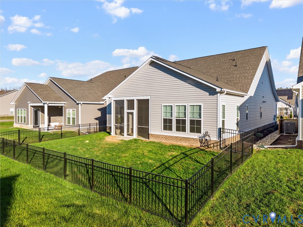 1813 Galley Place Chester, VA 23836 - Photo 34 of 38 Rear view of property with a fenced backyard, a su