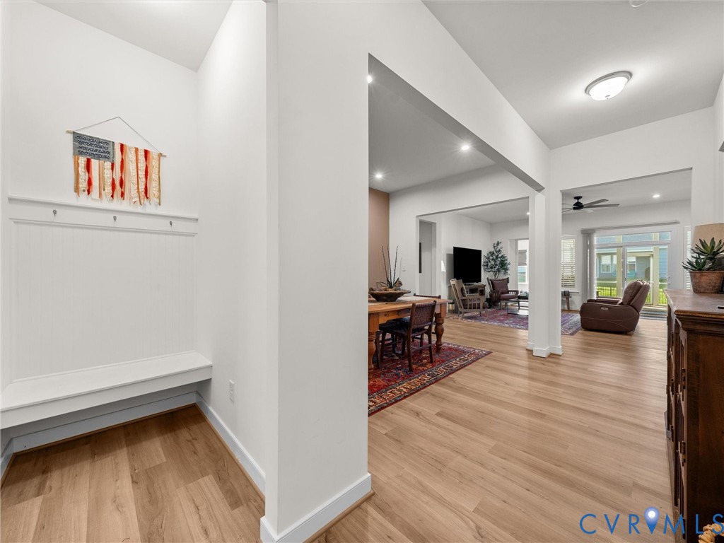 1813 Galley Place Chester, VA 23836 - Photo 5 of 38 Drop zone outside of garage entry with light wood-