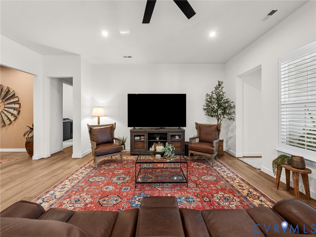 1813 Galley Place Chester, VA 23836 - Photo 10 of 38 Living room with light wood finished floors, a cei