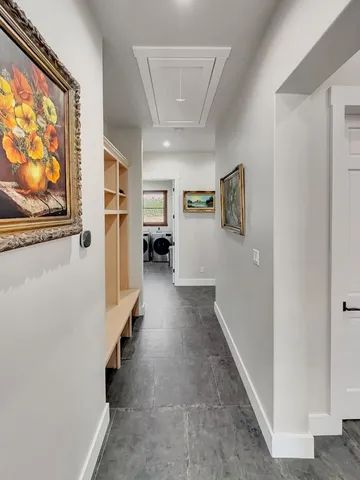 a view of hallway with windows