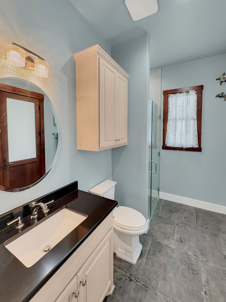 281 Inspiration Loop Comfort, TX 78013 - Photo 15 of 30 a bathroom with a sink and a mirror