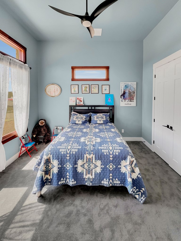 281 Inspiration Loop Comfort, TX 78013 - Photo 17 of 30 a bedroom with a bed and a window