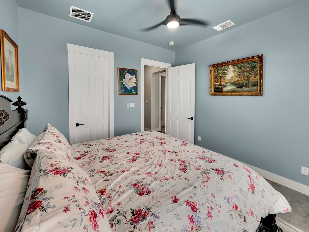 281 Inspiration Loop Comfort, TX 78013 - Photo 19 of 30 a bedroom with a bed and a window