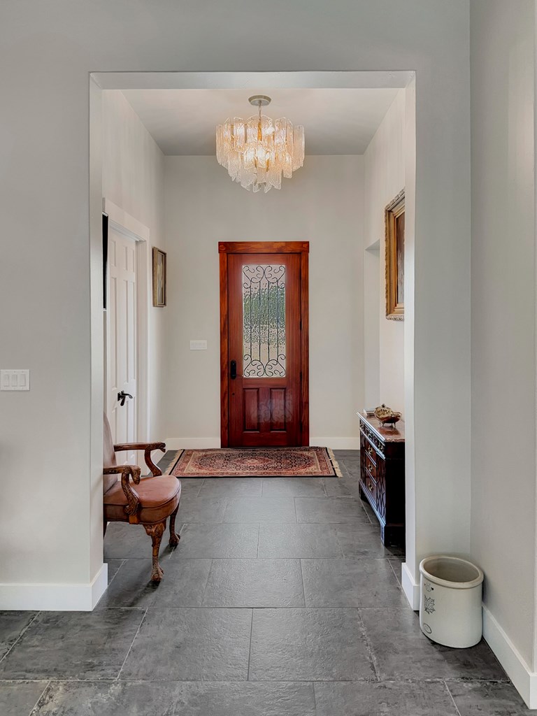 281 Inspiration Loop Comfort, TX 78013 - Photo 7 of 30 a living room with furniture and a chandelier