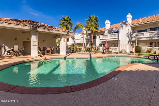 a view of a house with a swimming pool