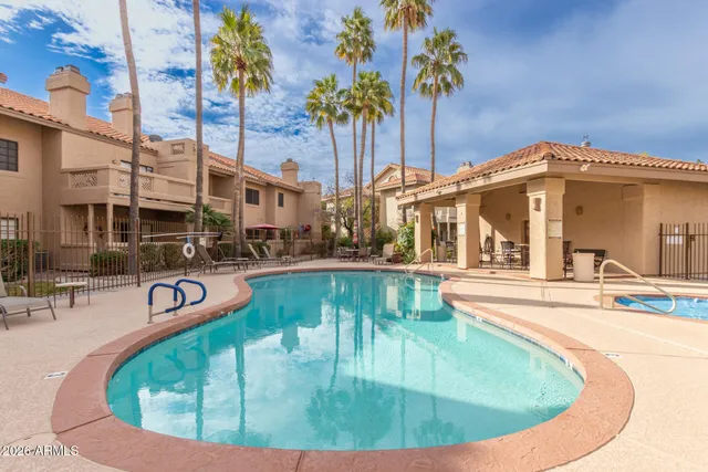a view of a house with swimming pool