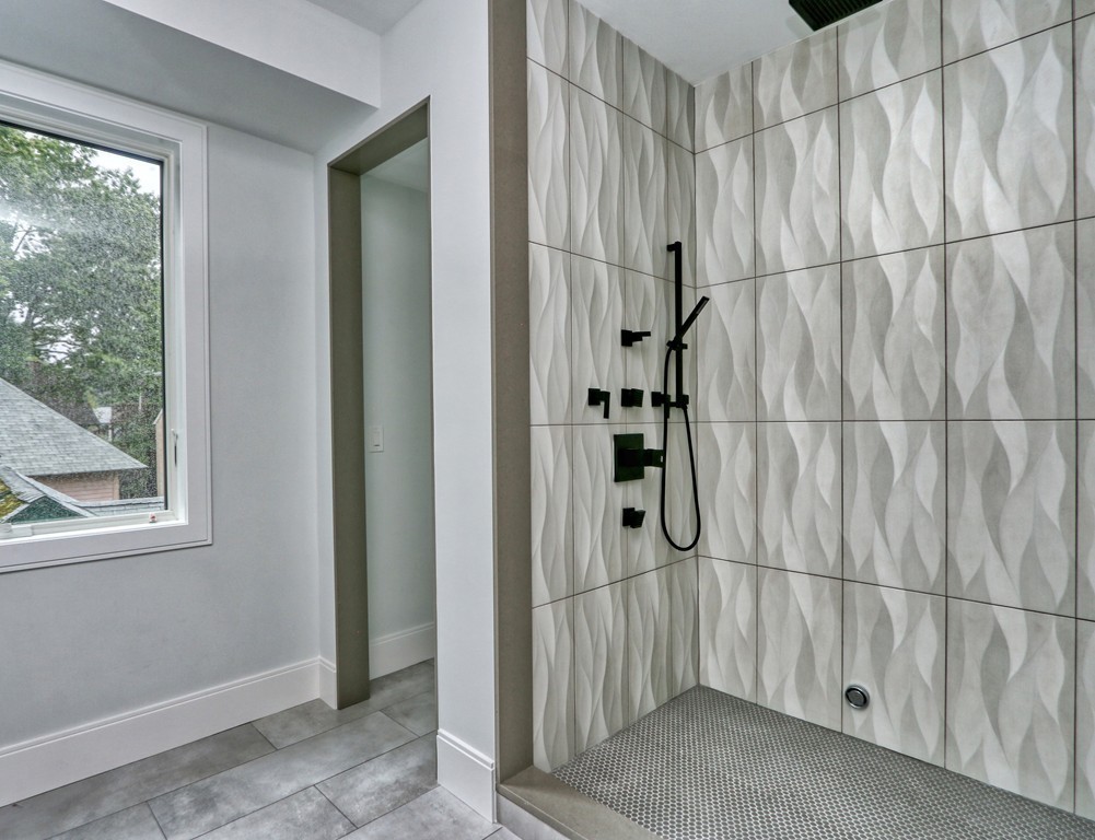75 Greenough Street, Unit 1 Brookline, MA 02445 - Photo 14 of 22 a bathroom with a shower