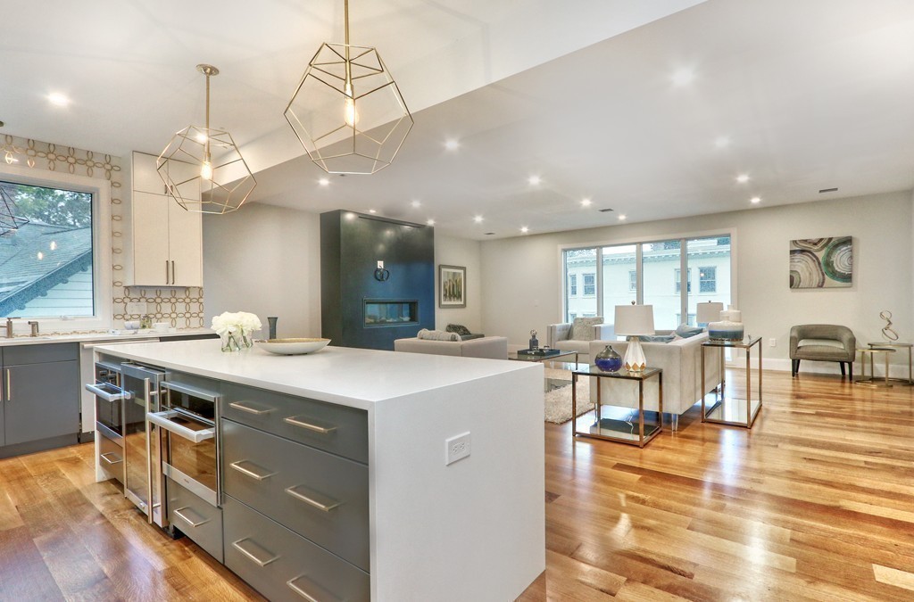 75 Greenough Street, Unit 1 Brookline, MA 02445 - Photo 5 of 22 a large kitchen with a table and chairs