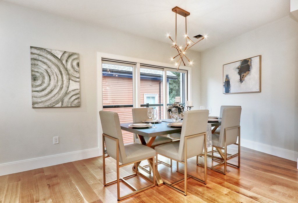 75 Greenough Street, Unit 1 Brookline, MA 02445 - Photo 10 of 22 a view of a dining room with furniture window and wooden floor