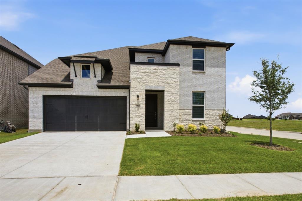 2911 Hanscom Street Forney, TX 75126 - Photo 15 of 40 Modern two-story residence featuring a brick and stone facade