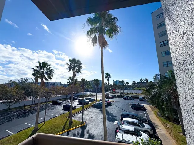 a view of swimming pool with outdoor seating and a terrace