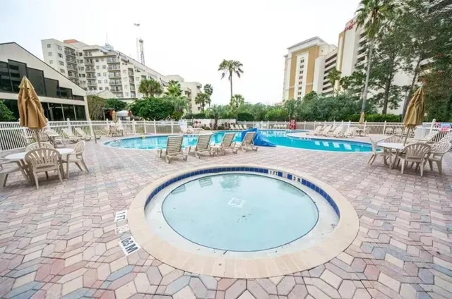 swimming pool view with a outdoor space
