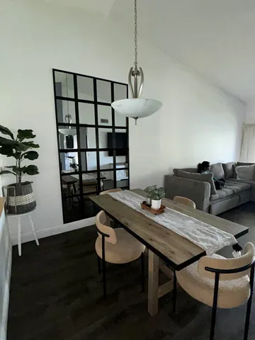 a view of a workspace with furniture