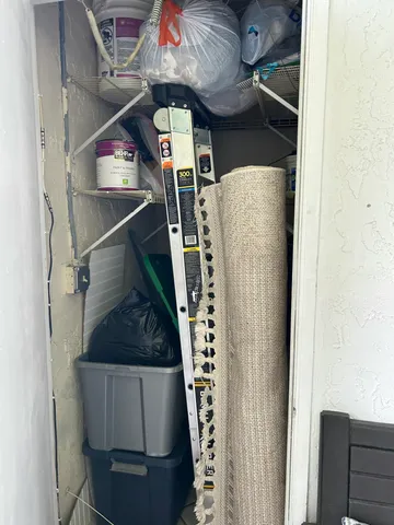 a view of storage and utility room