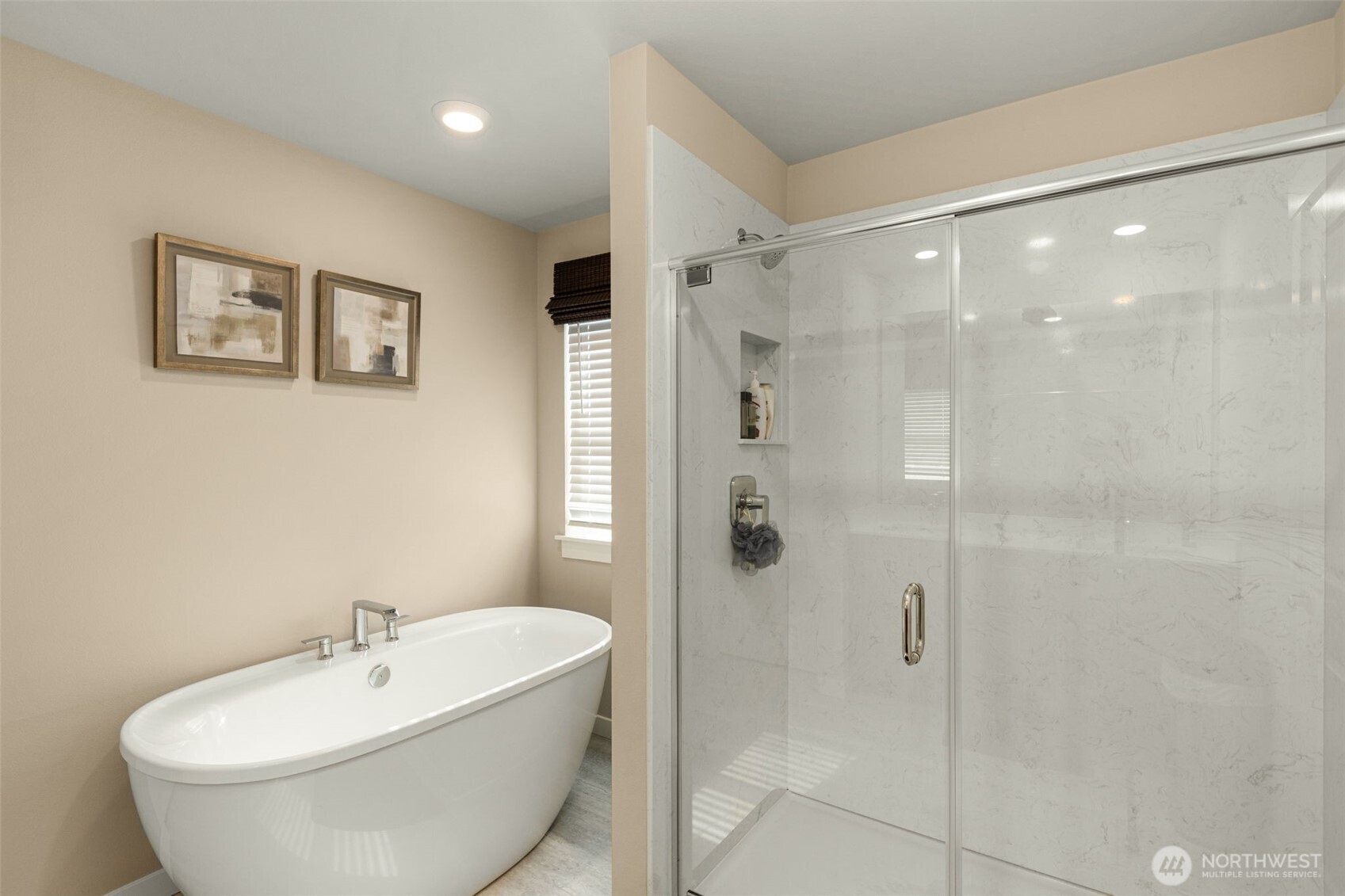 19410 28th Drive Southeast Bothell, WA 98012 - Photo 33 of 37 a bathroom with a white bath tub a shower and a sink