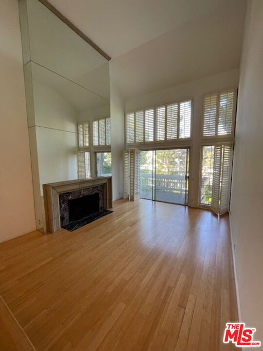 4338 Redwood Avenue, Unit B313 Marina del Rey, CA 90292 - Photo 2 of 31 a view of empty room with wooden floor and fan