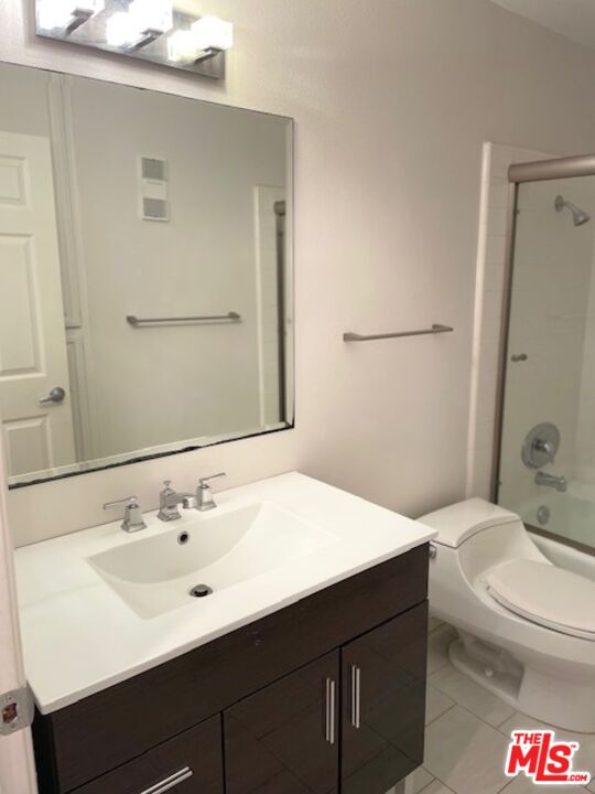 4338 Redwood Avenue, Unit B313 Marina del Rey, CA 90292 - Photo 25 of 31 a bathroom with a sink a toilet and shower