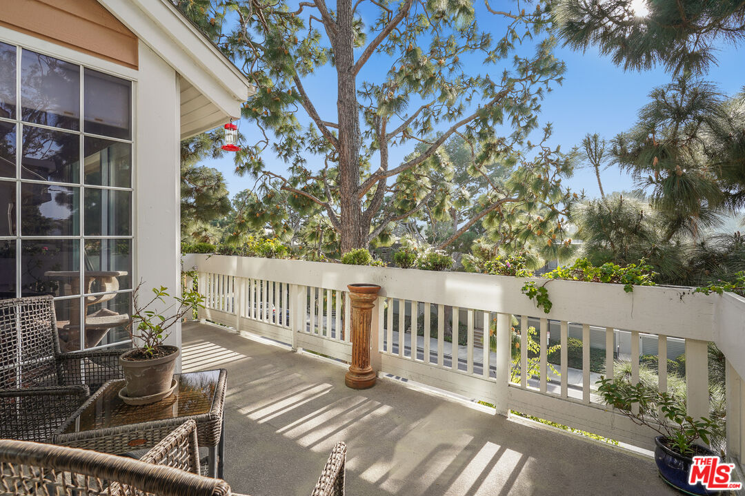 4338 Redwood Avenue, Unit B313 Marina del Rey, CA 90292 - Photo 8 of 31 a view of a chairs and table in the balcony