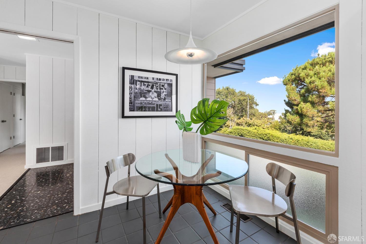 406 Middle Road Belmont, CA 94002 - Photo 15 of 67 a dining room with furniture and a floor to ceiling window