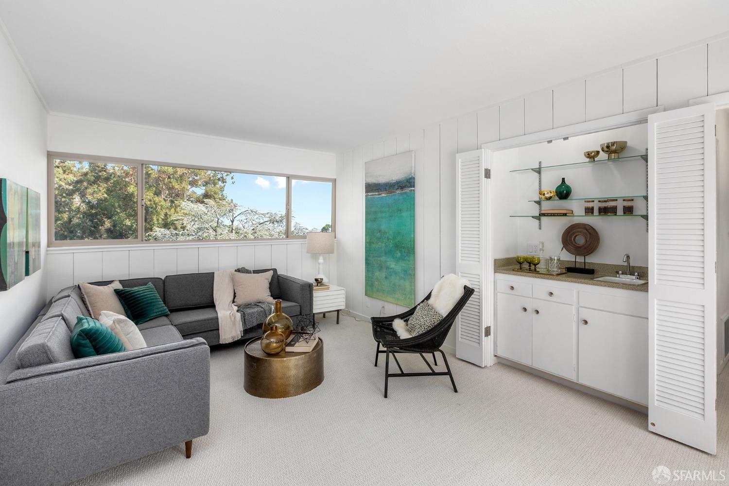 406 Middle Road Belmont, CA 94002 - Photo 20 of 67 a living room with furniture and a large window