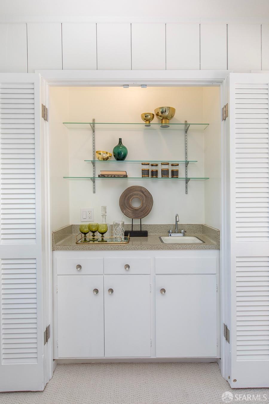 406 Middle Road Belmont, CA 94002 - Photo 21 of 67 a kitchen with granite countertop white cabinets and a stove