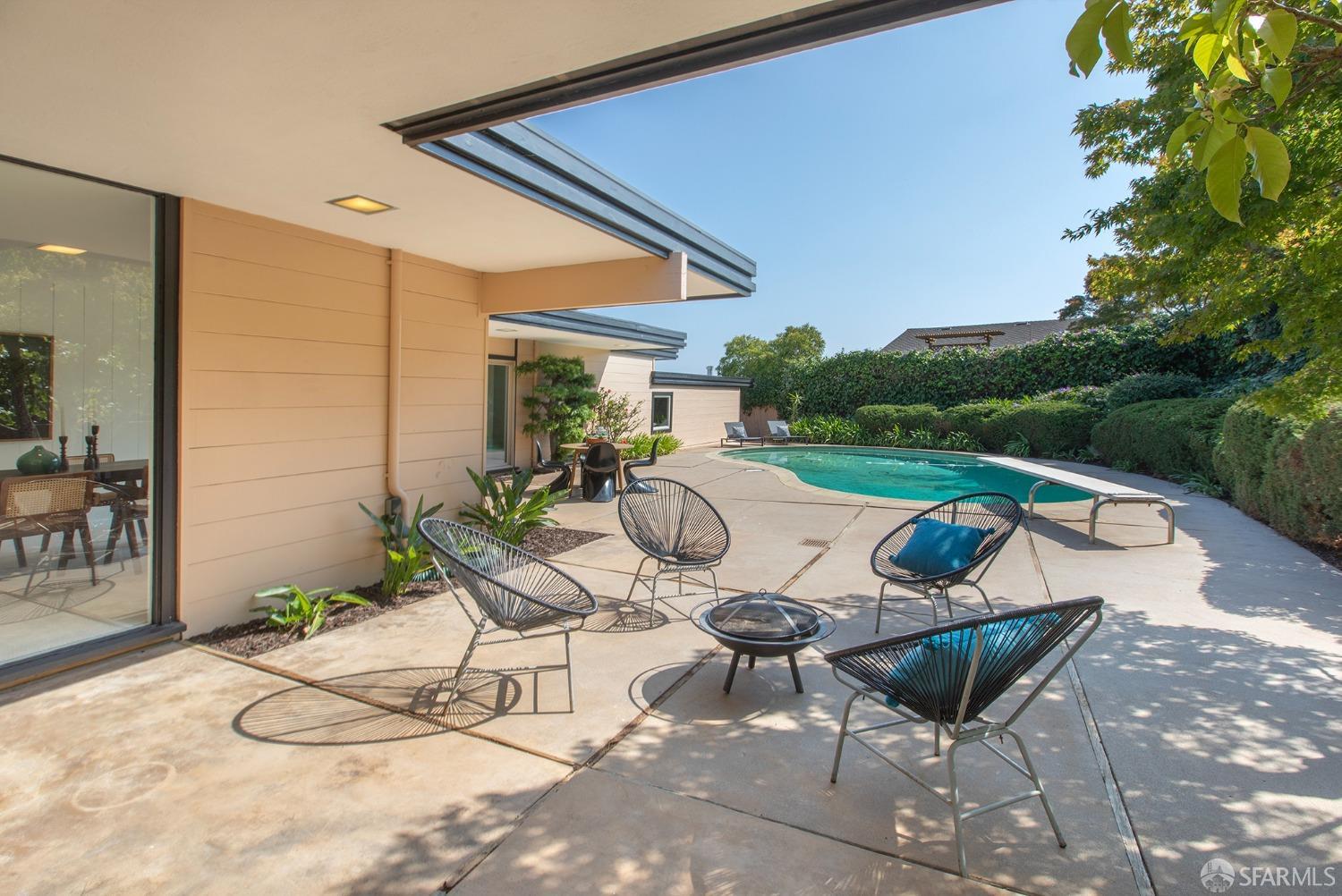 406 Middle Road Belmont, CA 94002 - Photo 30 of 67 a view of patio with table and chairs potted plants with wooden floor and fence