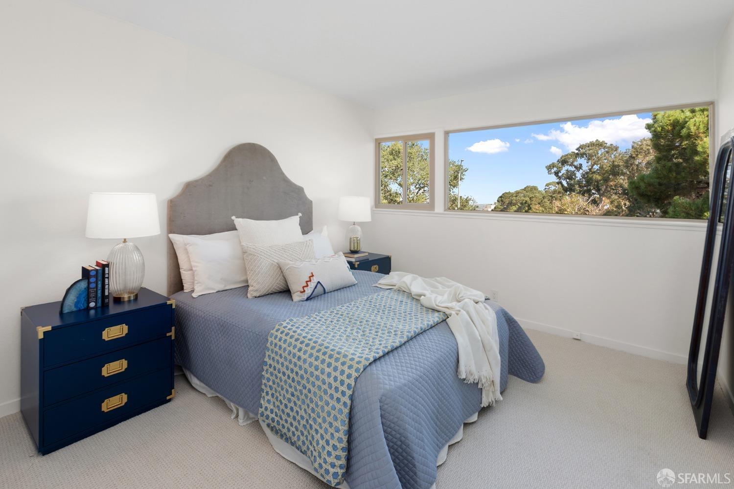 406 Middle Road Belmont, CA 94002 - Photo 39 of 67 a bedroom with a bed and a window